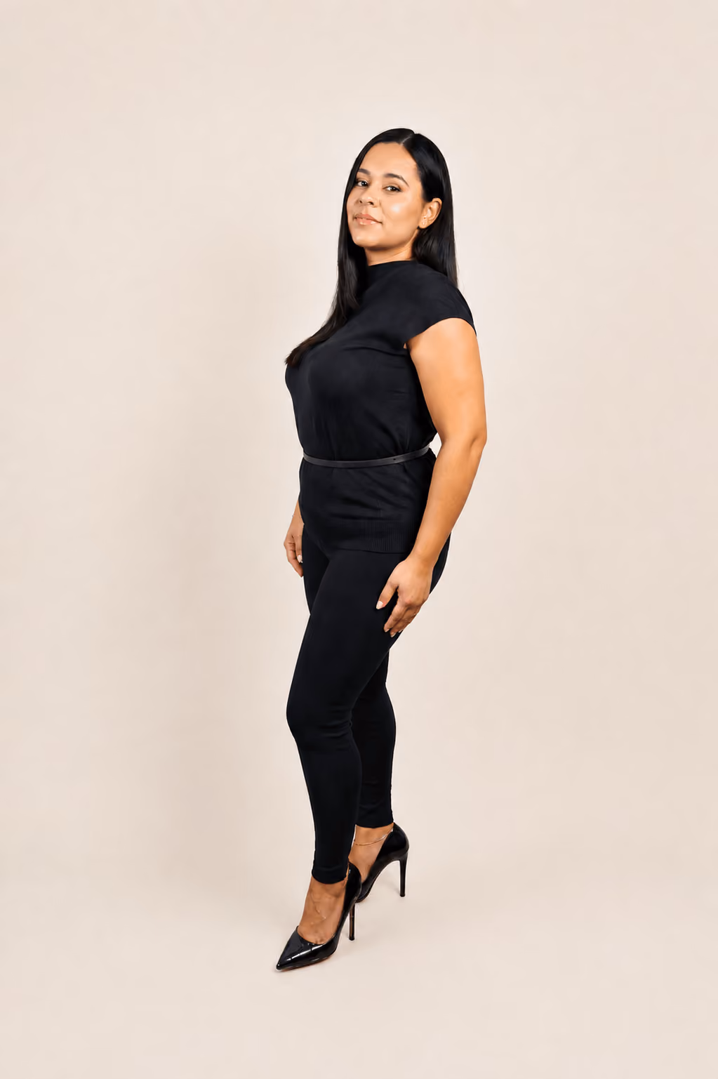 Ana, hair stylist at Mimi's Touch Salon.