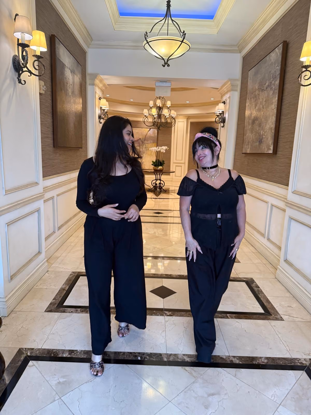 Mimi and a colleague, both in the house black, in the lobby of the building on Ponce de Leon Boulevard.